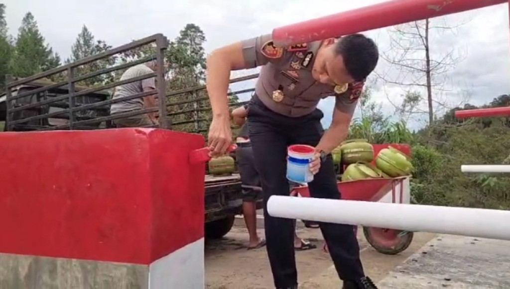 Kapolres Taput Wujudkan Bangun Jembatan Merah Putih Penghubung Desa Pohan Jae