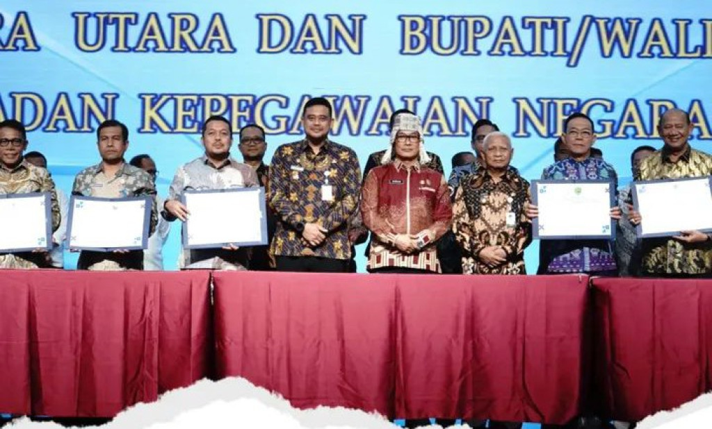 Buapti Paluta Menghadiri Penyerahan Sertifikat Penyaluran Dana Bagi Hasil. Periode Oktober Tahun 2025 Di Medan.