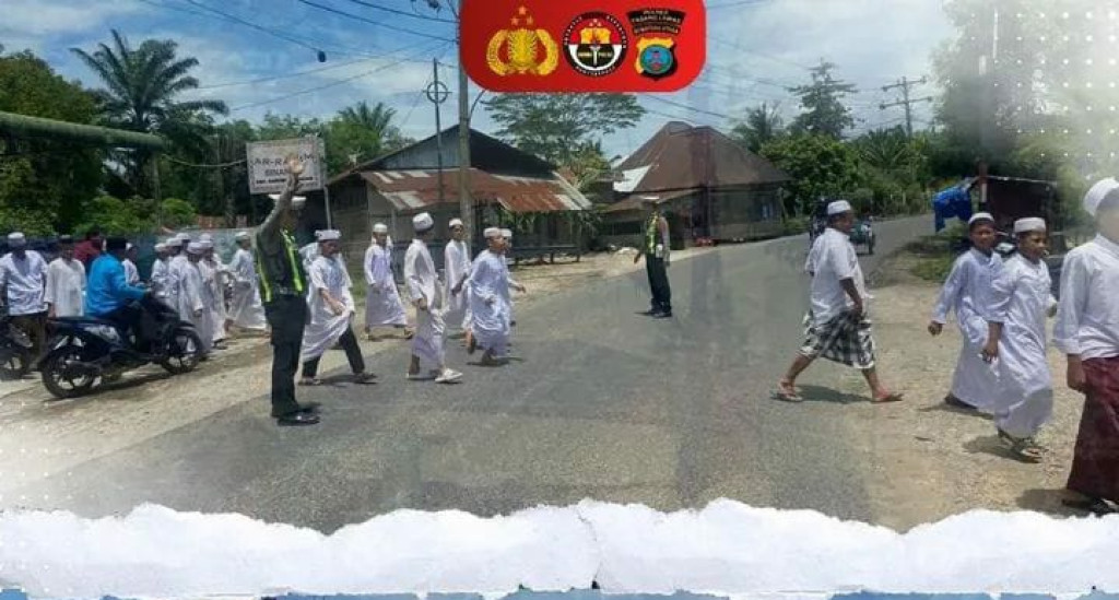 Personil Pos Lantas Polsek Barteng Laksanakan Pam Padat Siang di Binanga